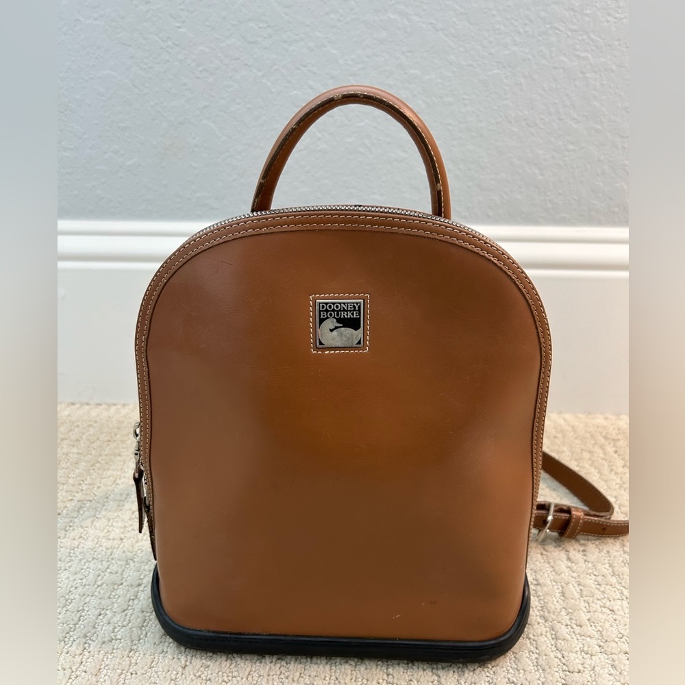 Vintage Dooney & Bourke Brown Leather Backpack with Dome Design
